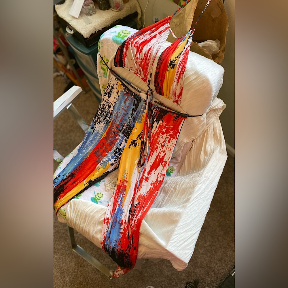 Multi color one piece strap up romper